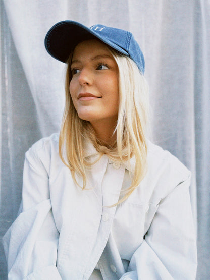 Borti caps "vintage" mørk blå/gul logo