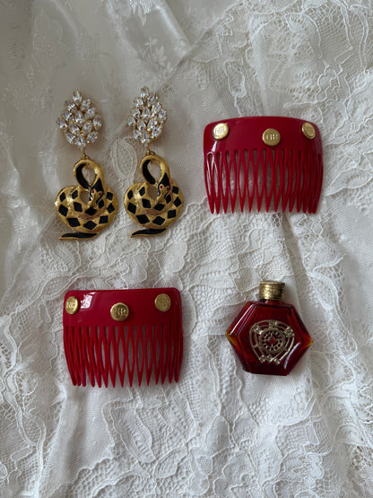 Hårkam rød Nina Ricci