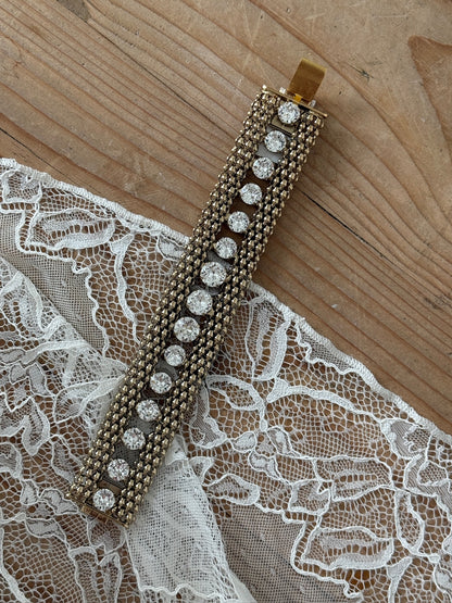 Armbånd gull med blanke stener