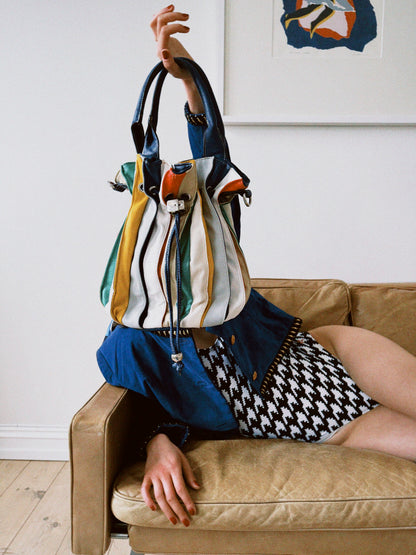 Bucket bag striper