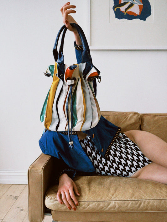 Bucket bag striper