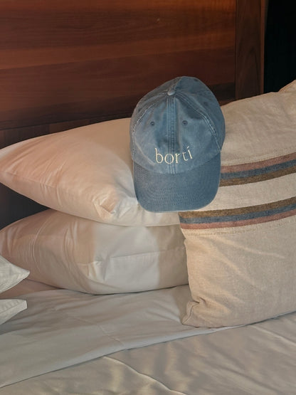 Borti caps "vintage" mellom blå/gul logo