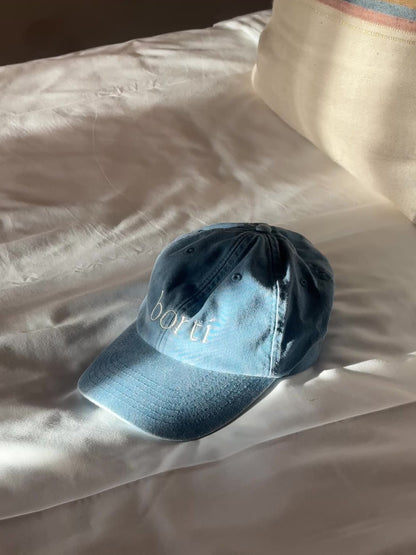 Borti caps "vintage" mellom blå/gul logo